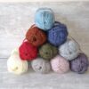 balls of aztec aran yarn in pyramid to show 10 colours available