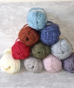 balls of aztec aran yarn in pyramid to show 10 colours available