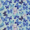 multi-directional tossed blue and ink butterflies on a pale blue ground