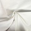 branching stems and flower petals tone on tone white cotton fabric