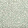 cream vine leaves on sage green ground cotton fabric. Morris style