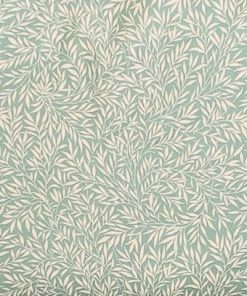 cream vine leaves on sage green ground cotton fabric. Morris style