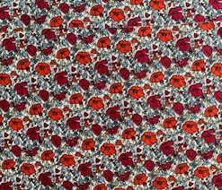 two shades of red poppies with smaller blue forget me nots on white