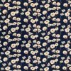 ananda viscose floral print on navy ground dressmaking fabric featuring scatter spaced small lowers with white petals and pink stems