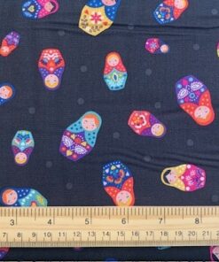 sample of little matryoshka with ruler for scale