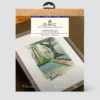 Package for DMC cross stitch kit showing scene of woodland in spring