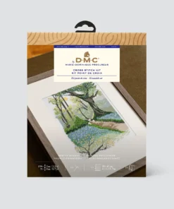 Package for DMC cross stitch kit showing scene of woodland in spring