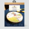 Package for DMC kit to embroider a figure amongst yellow tulips