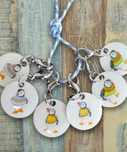 showing two each of three designs of crochet stitch markers