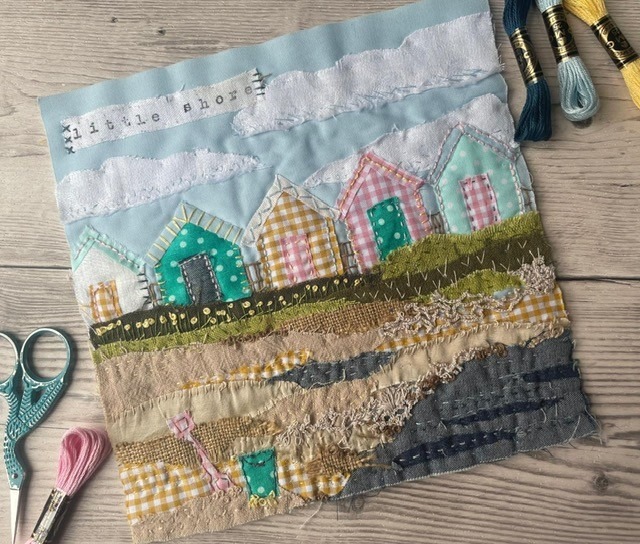 completed textile collage of beach huts