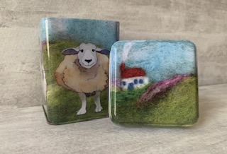 felted sheep tin with lid beside it